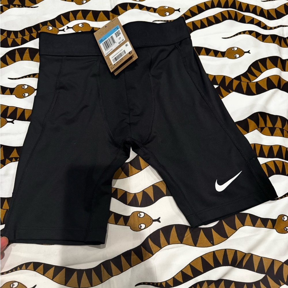 Nike Black Kids Training Shorts with White Tag Accent